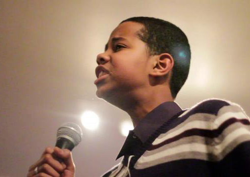 Mustafa Ahmed in a spoken word performance. Photo SpeakOutPoetry. - MUSTAFA_AHMED_SPEAKOUTPOETRY