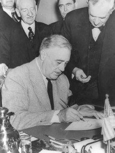 President Roosevelt signs declaration of war on Dec. 8, 1941.