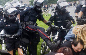 Demonstrators tangle with Toronto police during G20 protest in 2010.