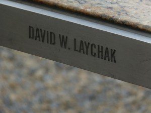 Name plate on the bench in tribute to David Laychak, killed inside the Pentagon on September 11, 2001.